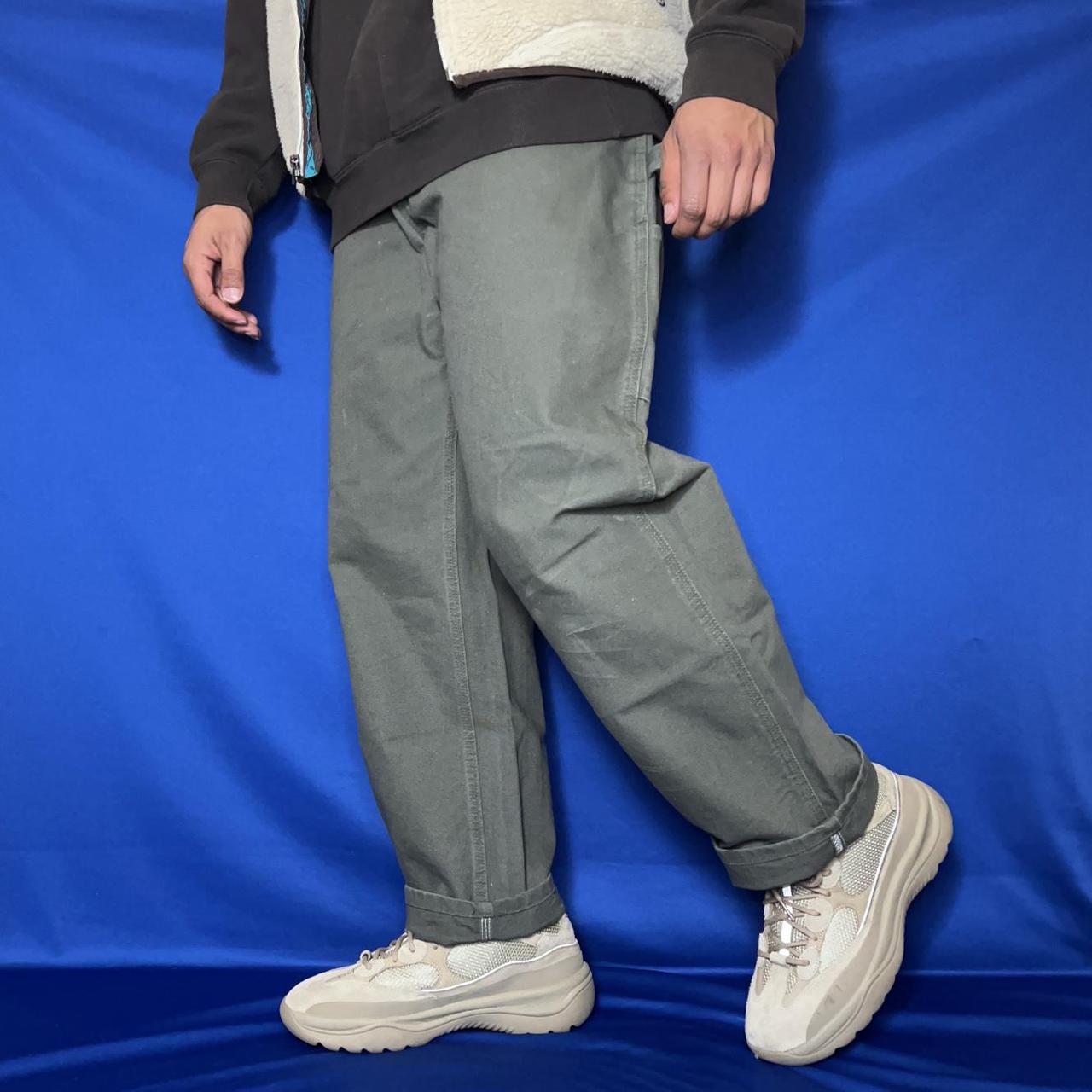 green carhartt carpenter pants