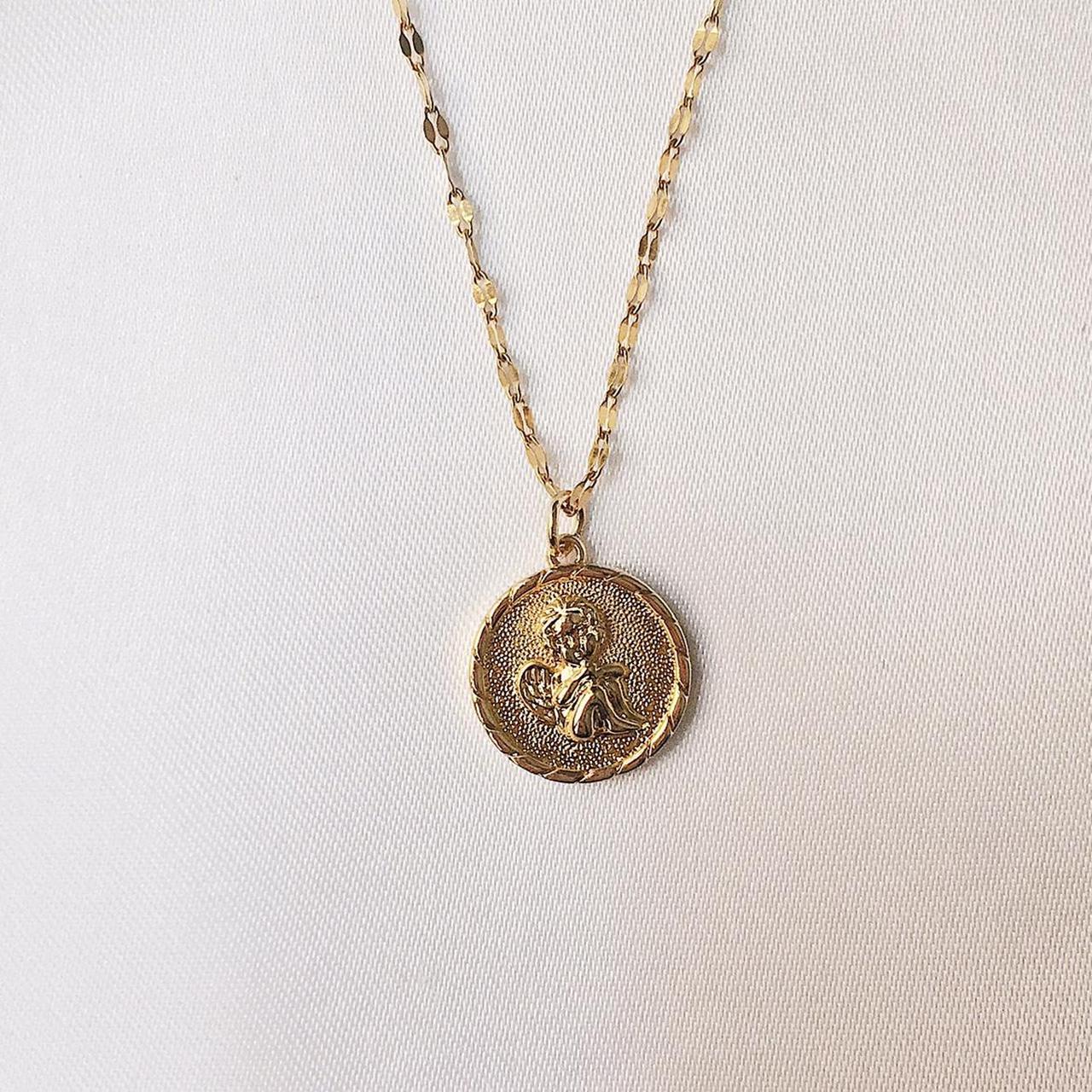 new! gold angel coin necklace part of our... - Depop