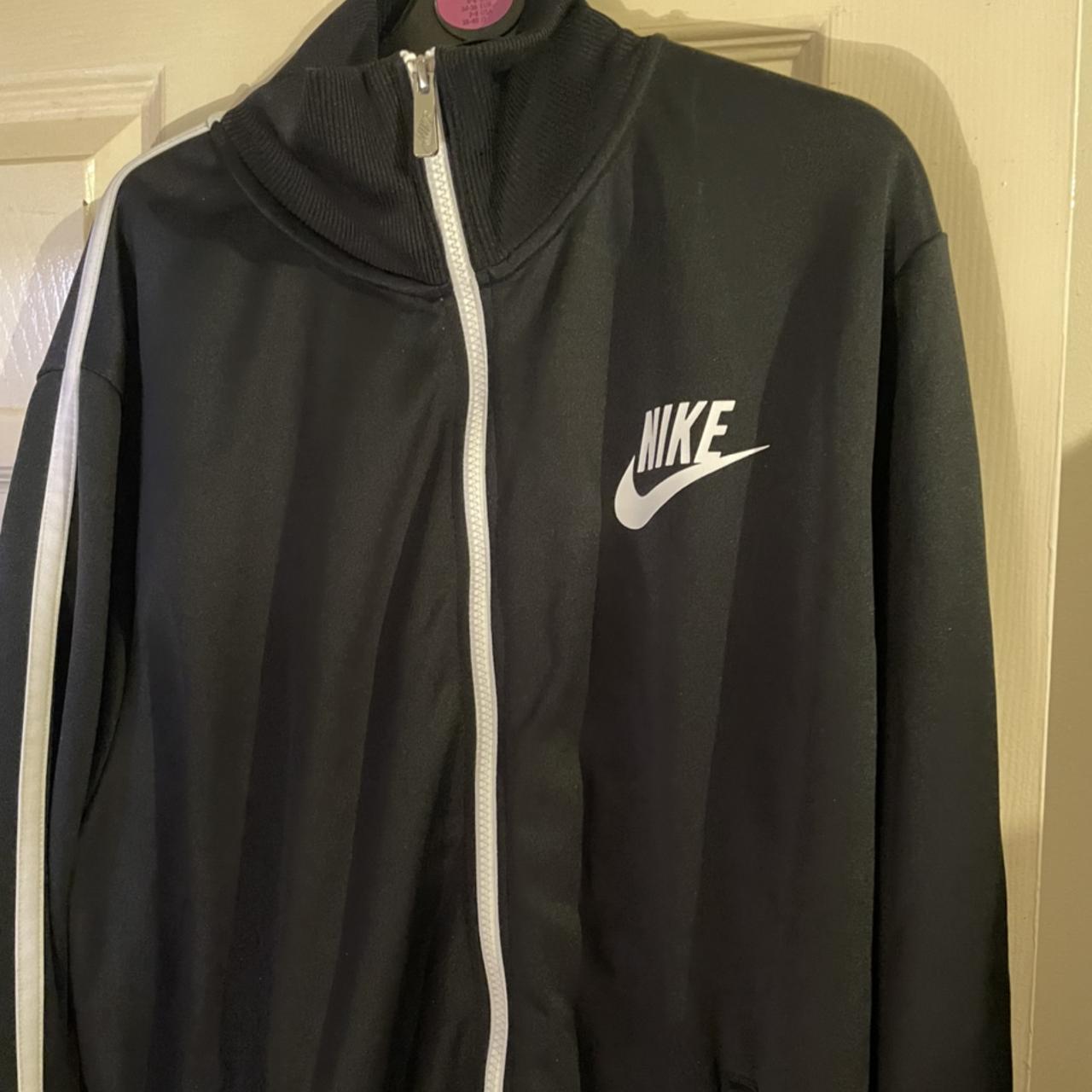 Nike track jacket slight bobbling on right side of... - Depop
