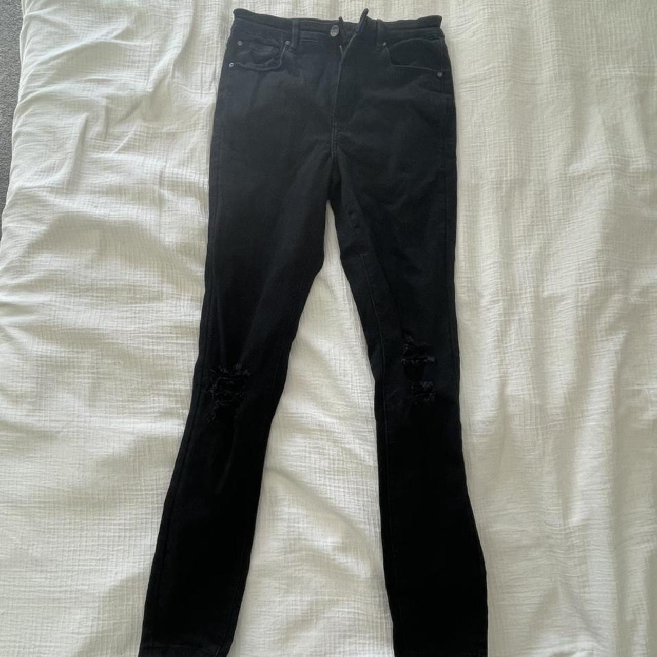 black skinny jeans high-waisted has rips at the knee... - Depop