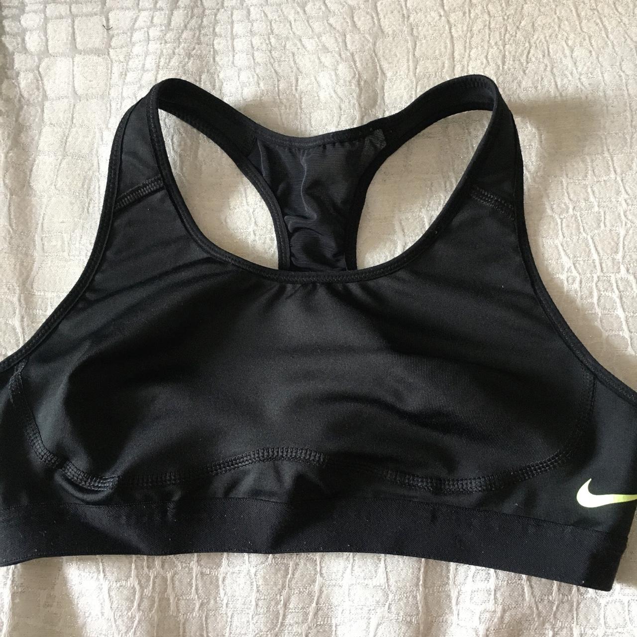 Nike sports bra. Black. Neon tick. Worn once still - Depop