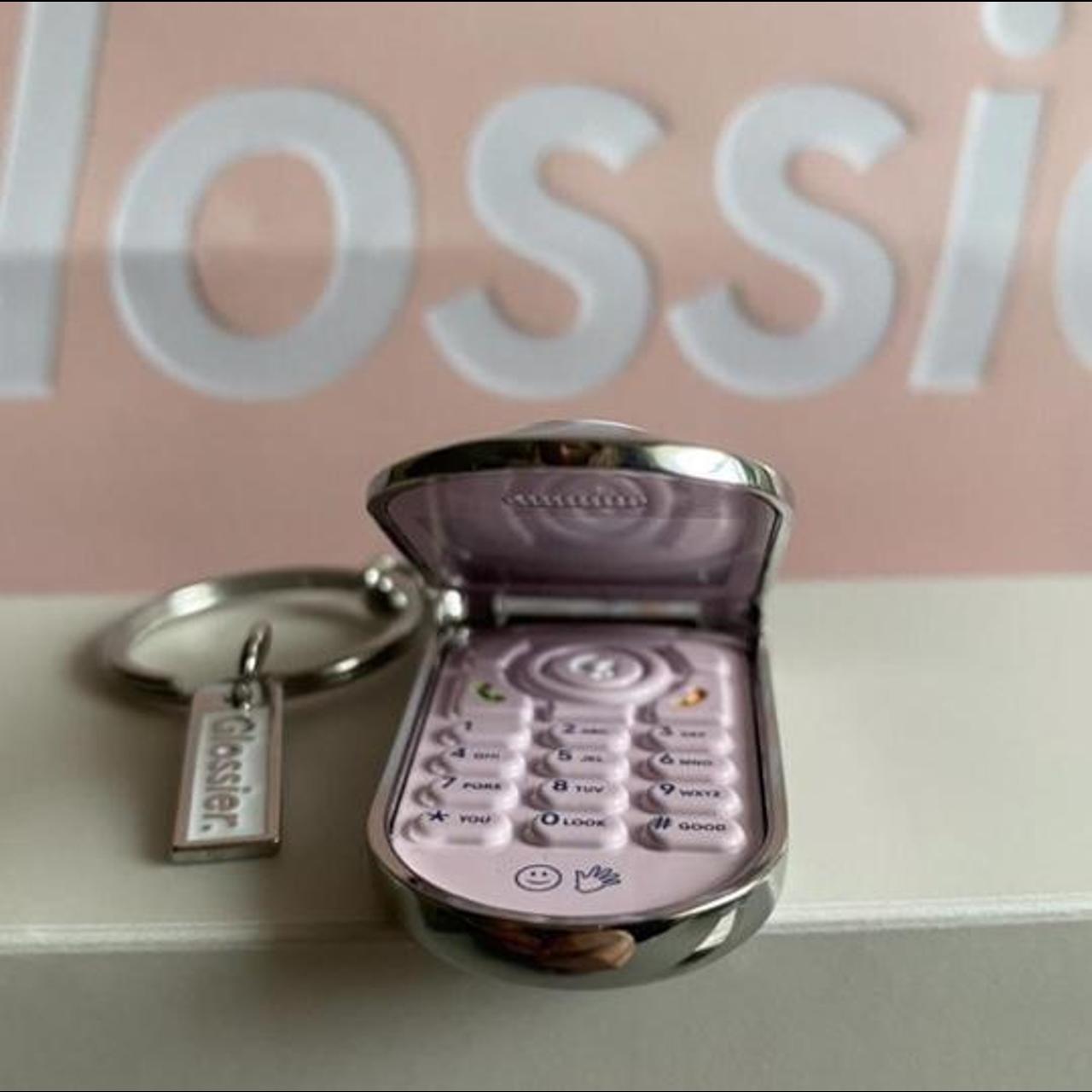 Shop Glossier Unisex Logo Keychains & Bag Charms by angel-pass