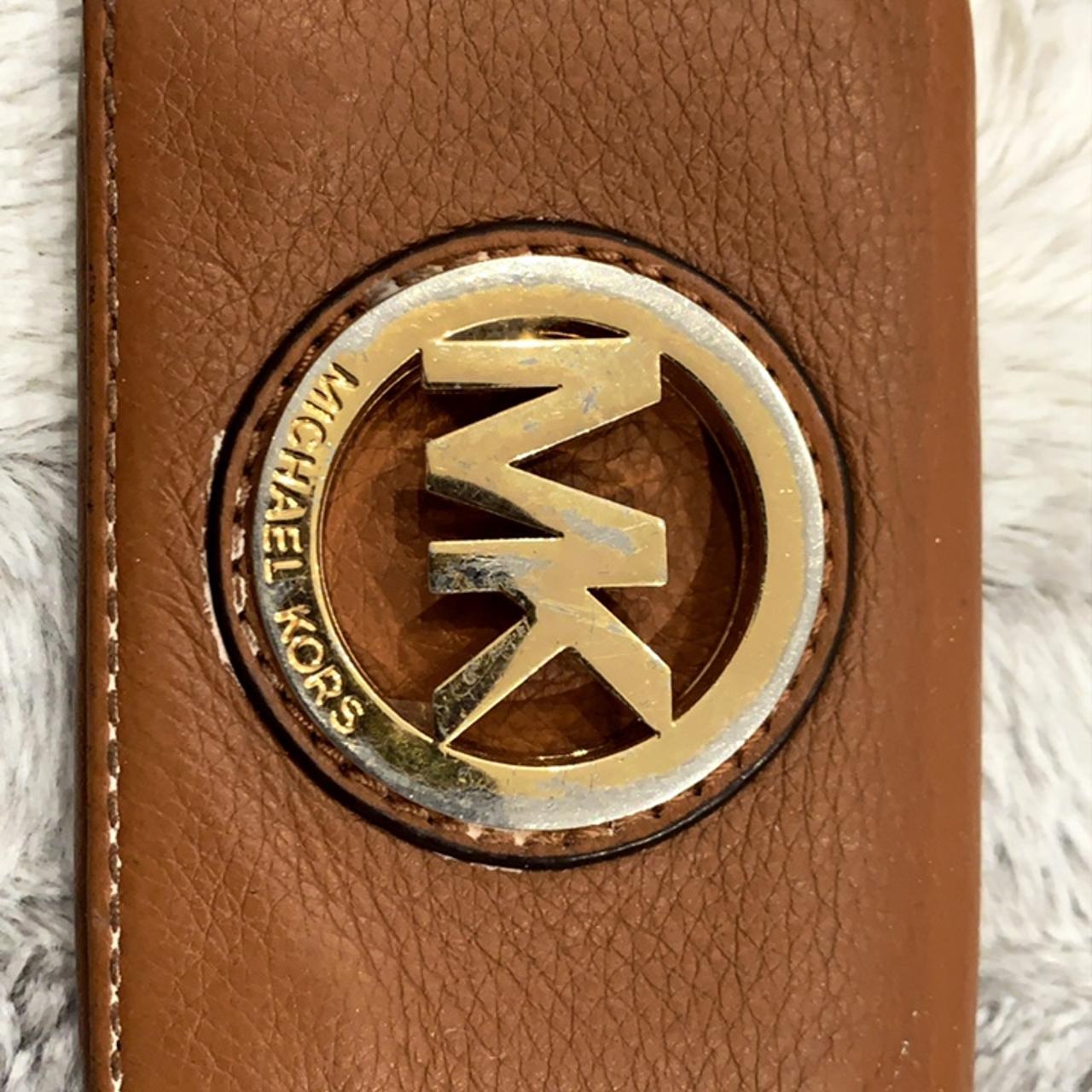 Michael Kors card holder was purchased in New York. Depop