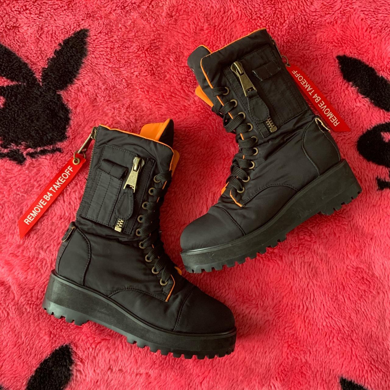 Dolls Kill Women's Black and Orange Boots Depop
