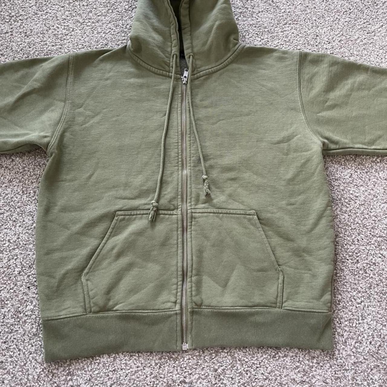 Brandy Melville army green Christy hoodie. Fits size... Depop