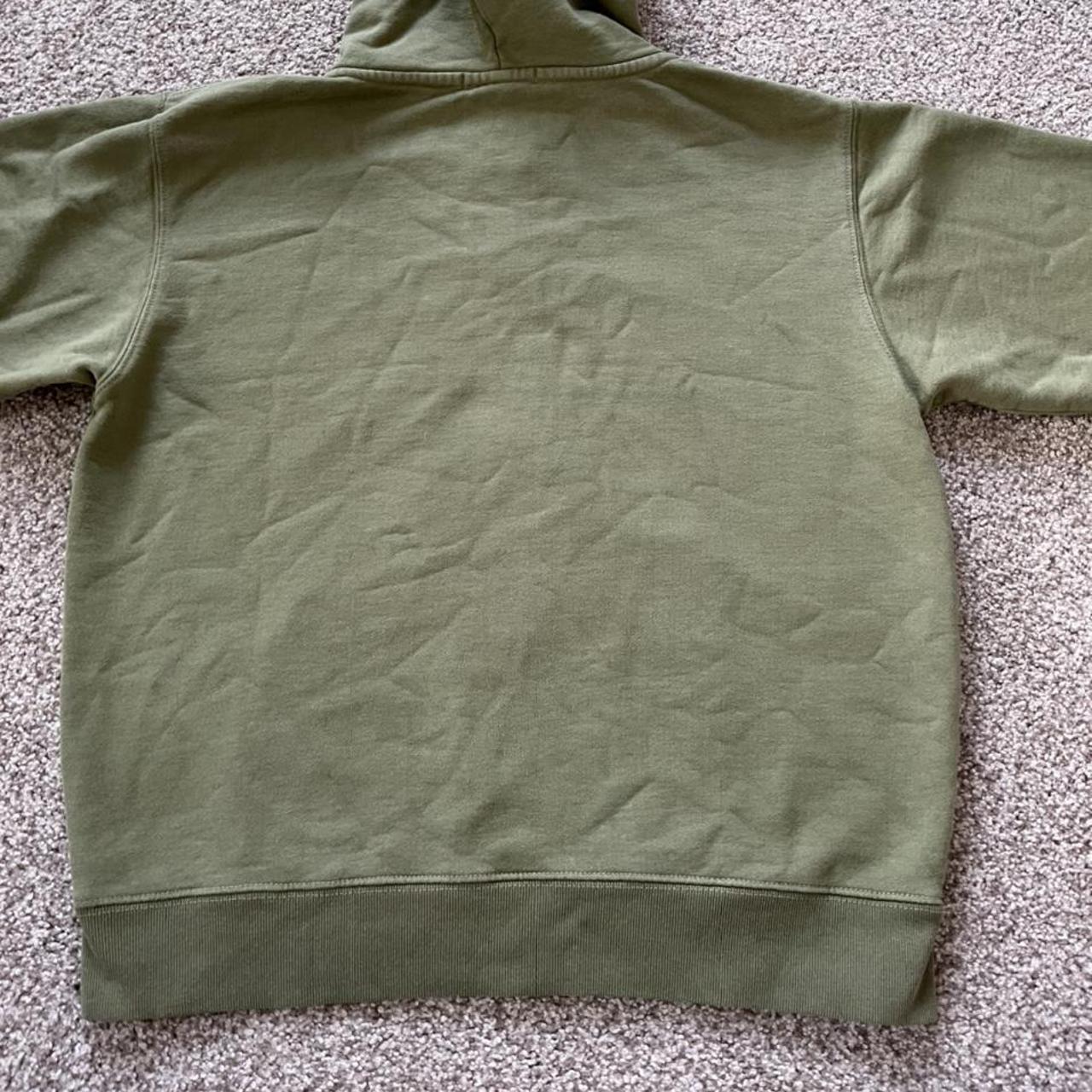 Brandy Melville army green Christy hoodie. Fits size... Depop