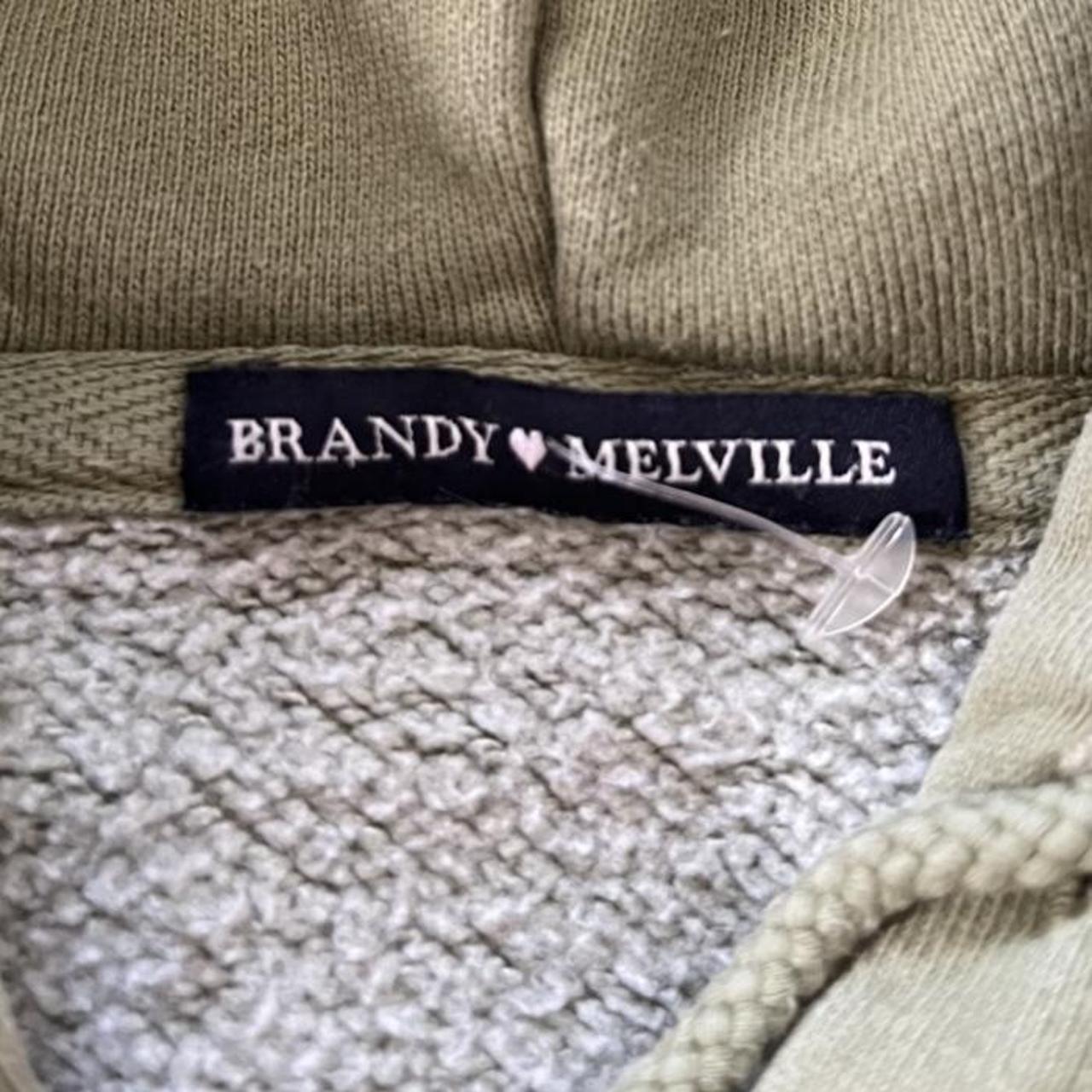 Brandy Melville army green Christy hoodie. Fits size... Depop