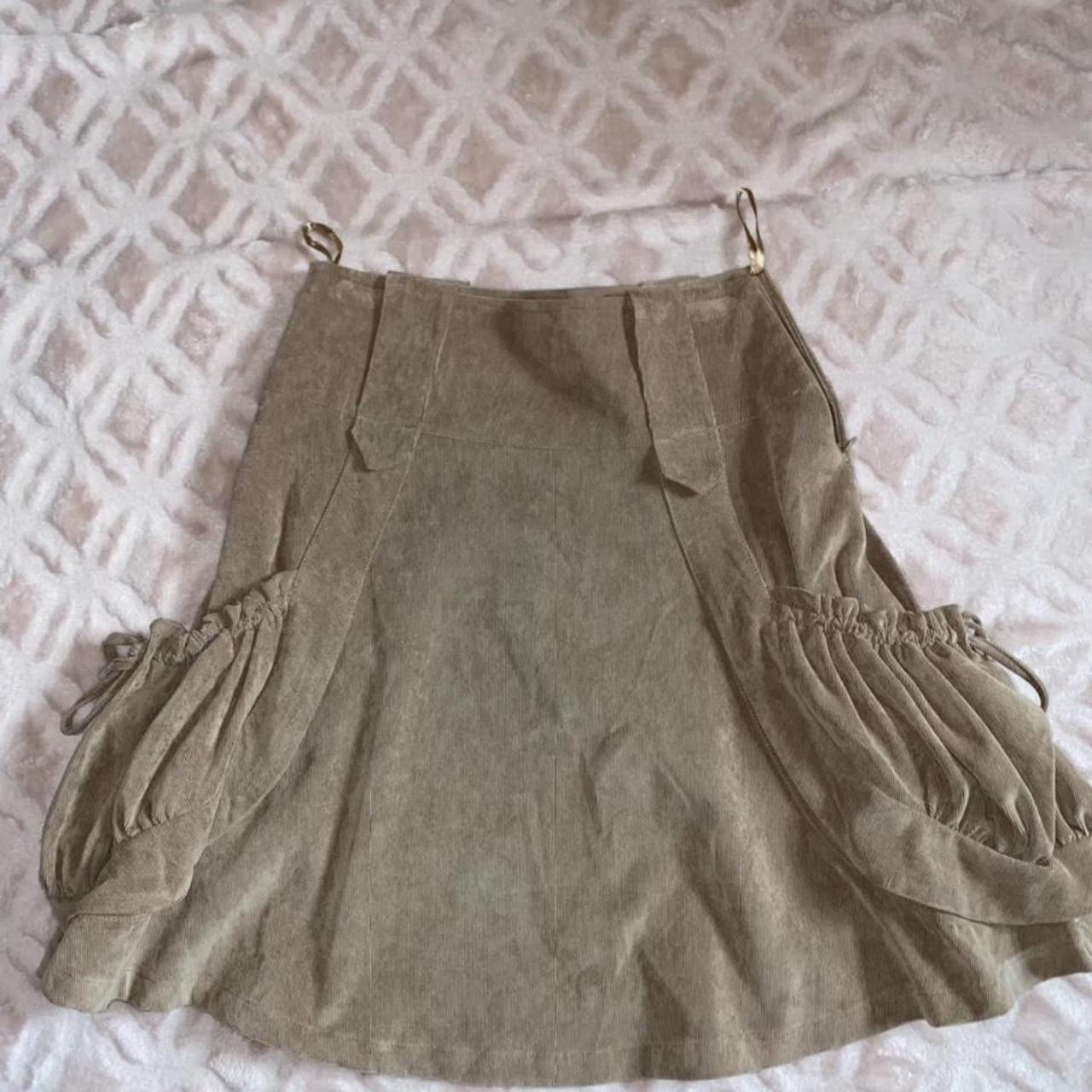 This corduroy skirt is brown with 2 pockets on each... - Depop