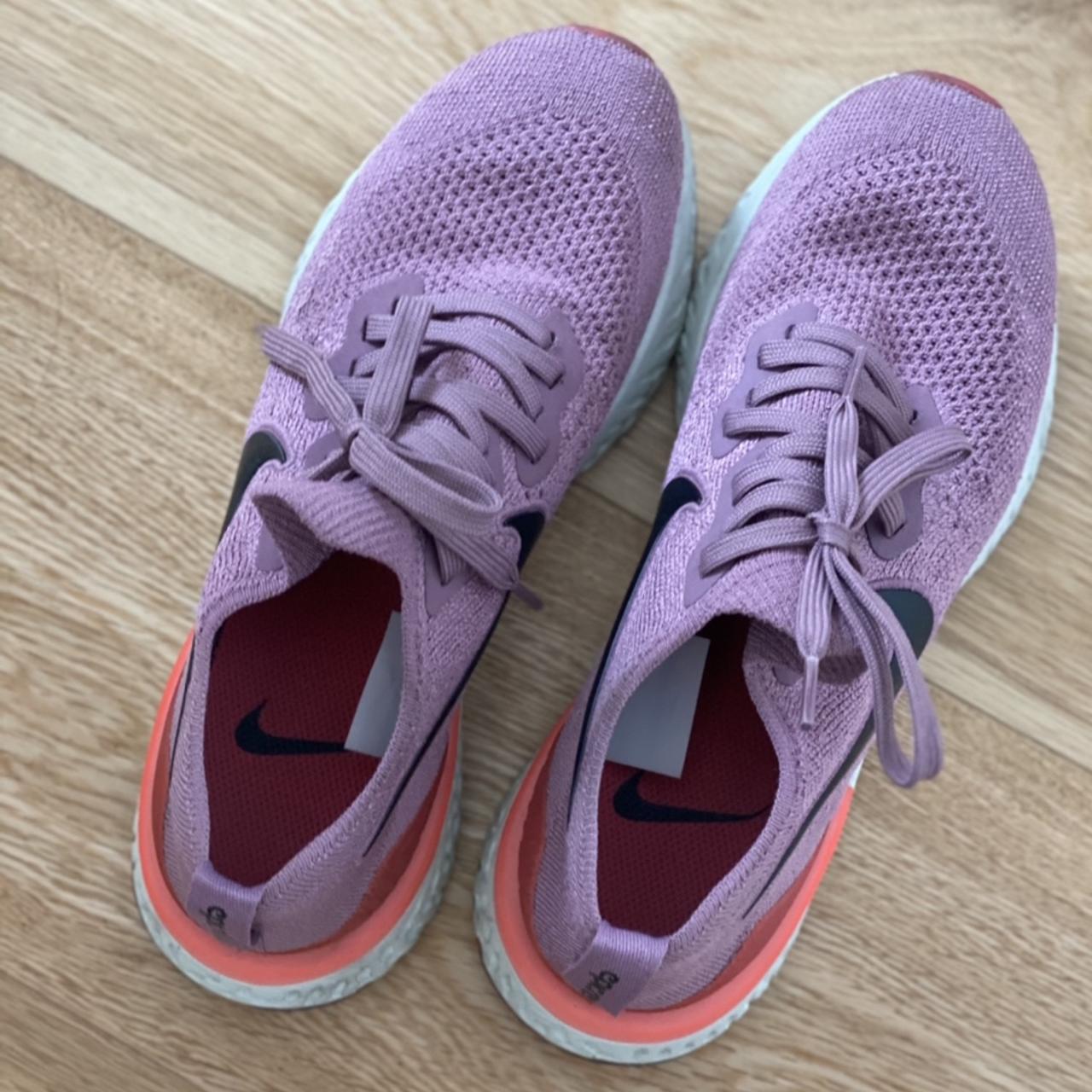 nike running epic react trainers in white and pink