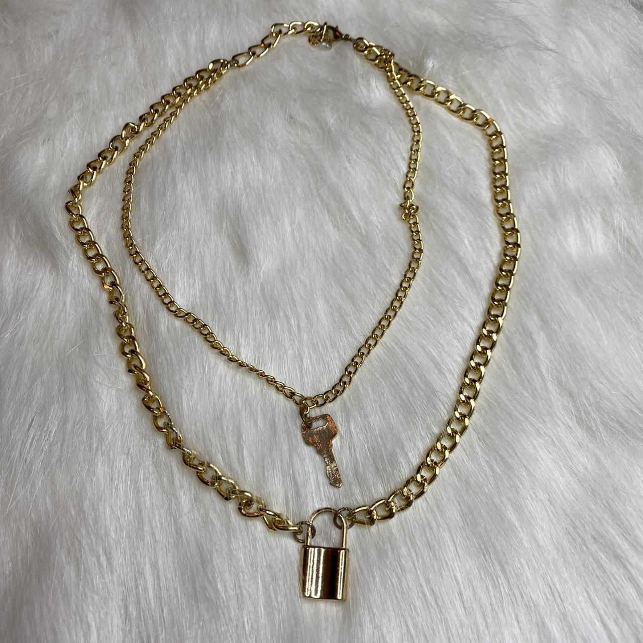 gold chain lock and key necklace bought a an... Depop