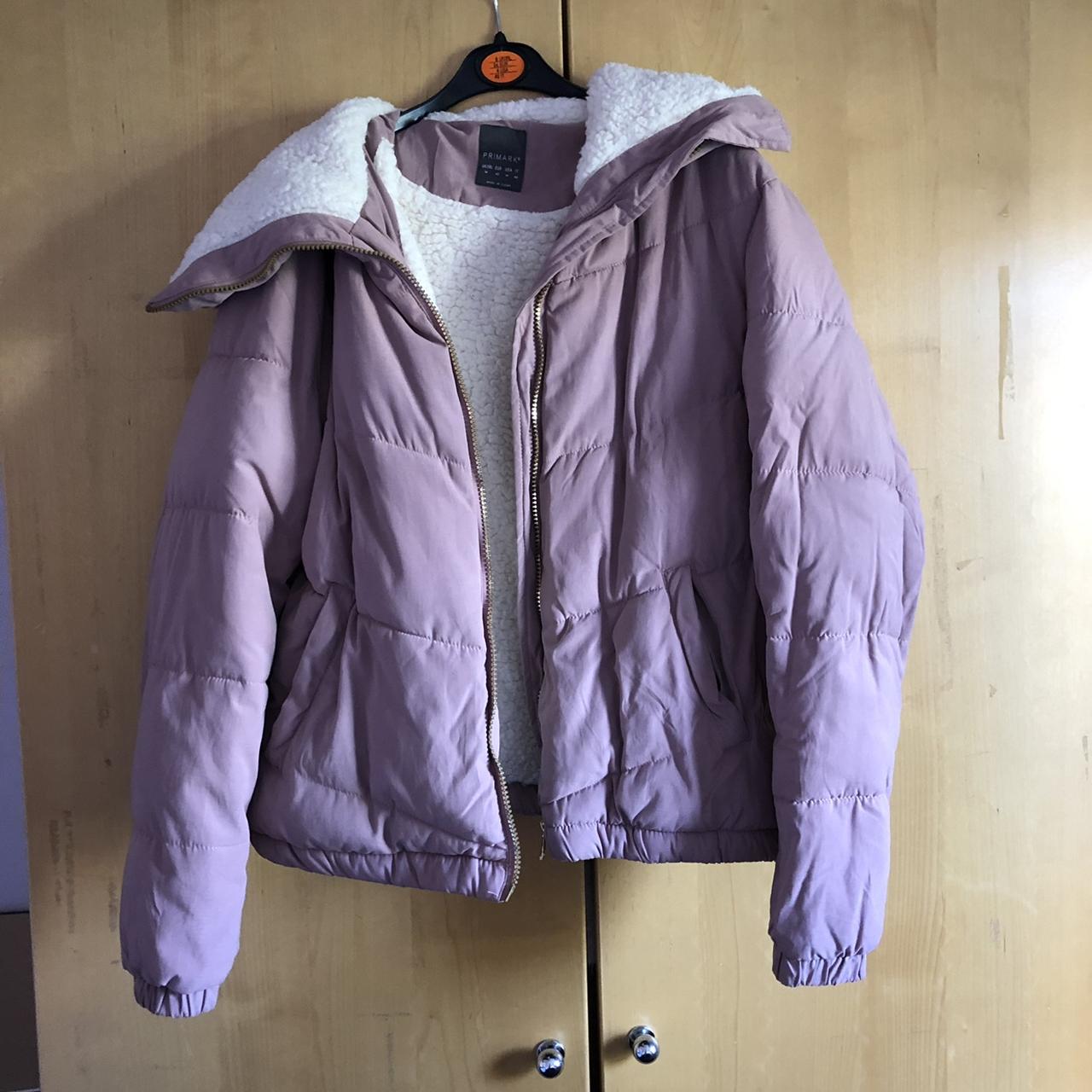 Primark baby pink puffer coat. Size 14 but would... - Depop