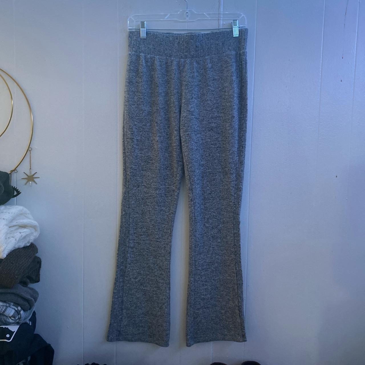 grey yoga pants. not sure of size but they fit like... - Depop