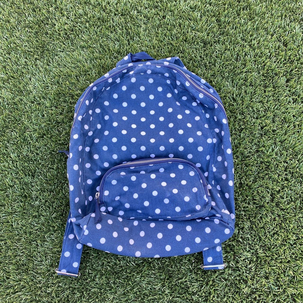 Blue polka dot backpack online