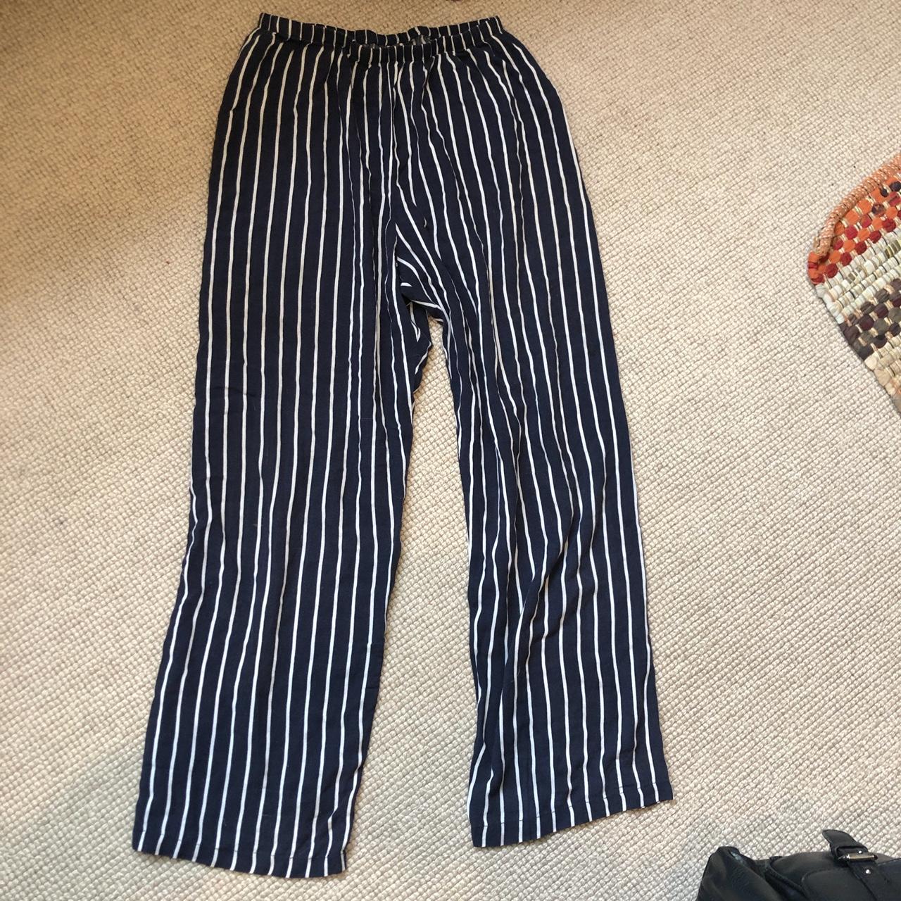 stripey flowy trousers made of light material with... - Depop