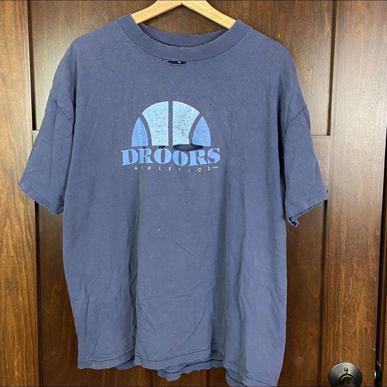 Vintage 1995 Droors Clothing (DC) logo shirt holes... - Depop