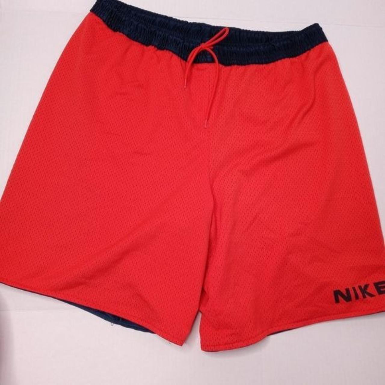 Nike red basketball shorts with navy lining. The... - Depop