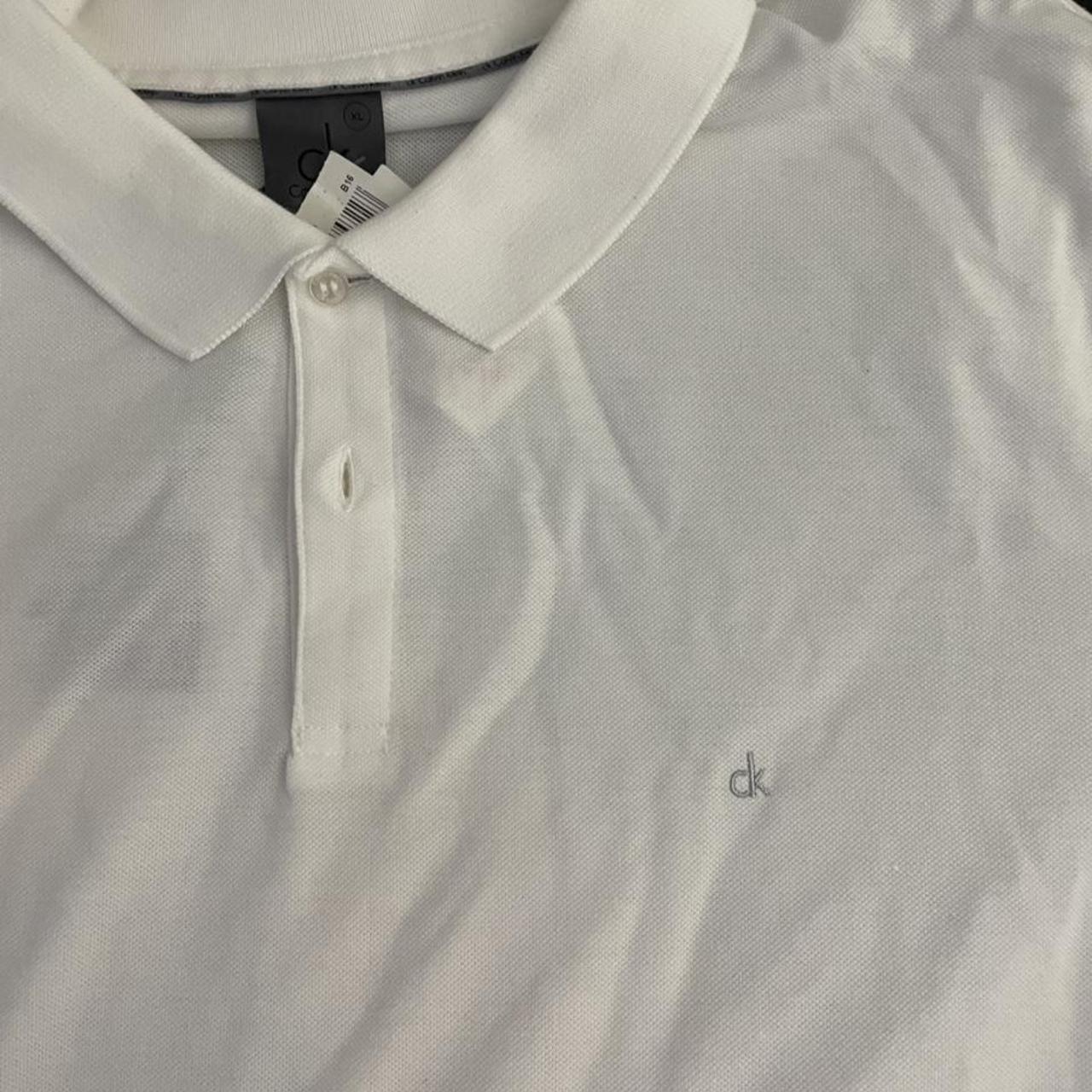 Calvin Klein Men's White Polo-shirts | Depop