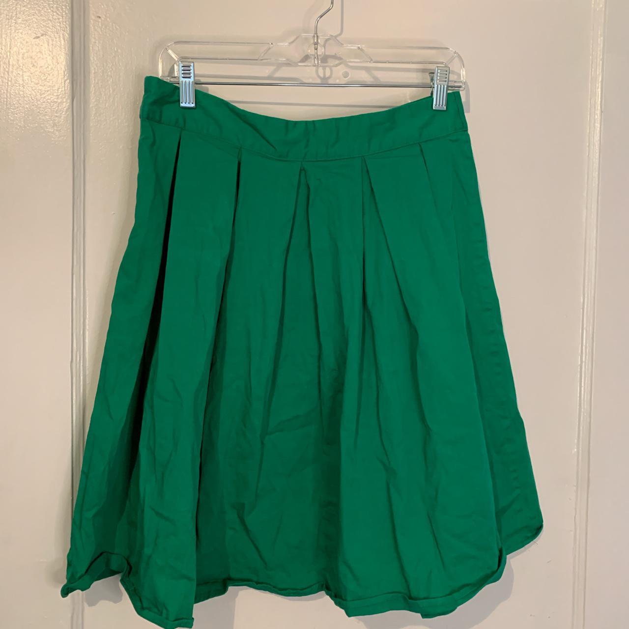 Green pleated skirt, size Large. I'm a 12/14 and it... - Depop