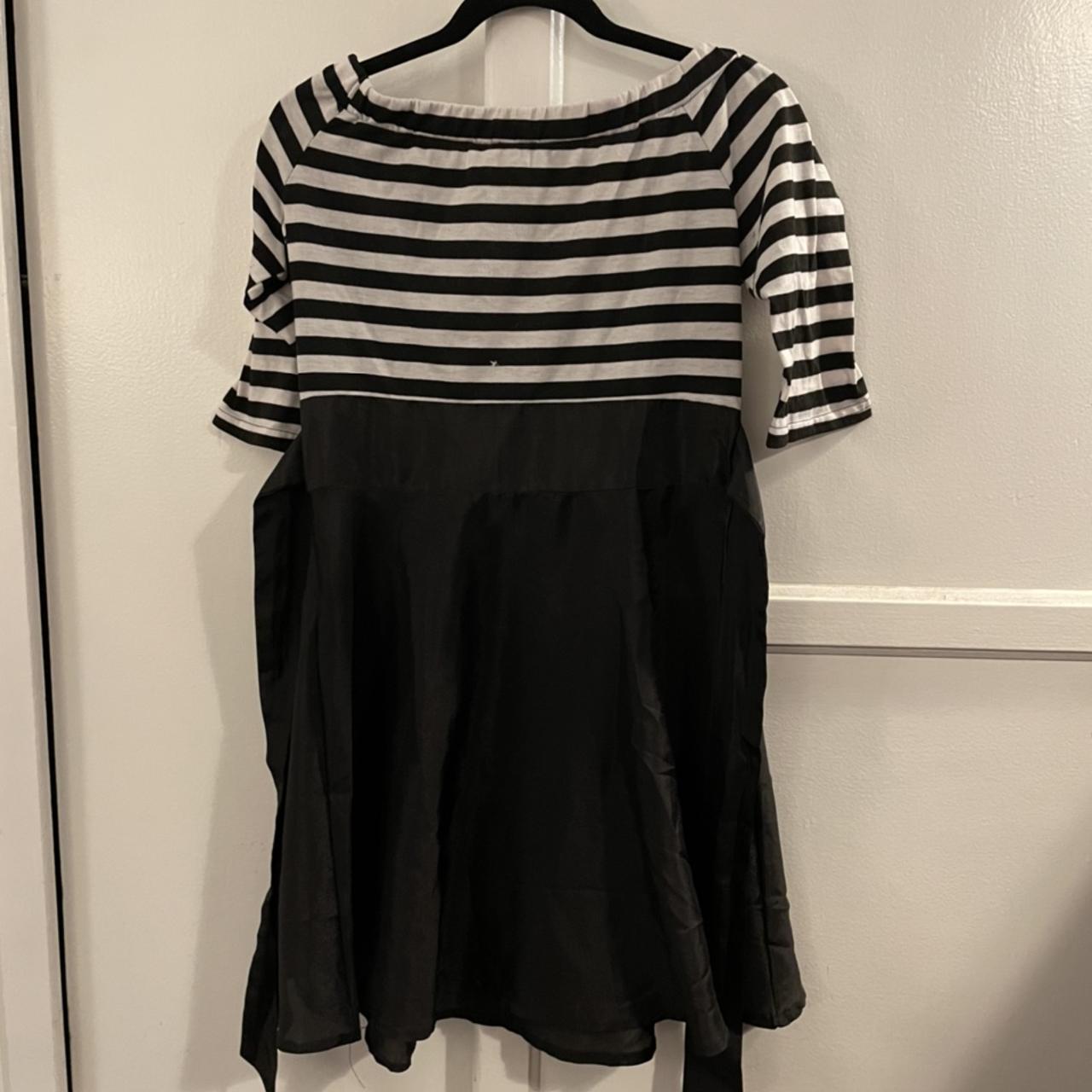 This black and white dress is sure to turn heads. It... - Depop