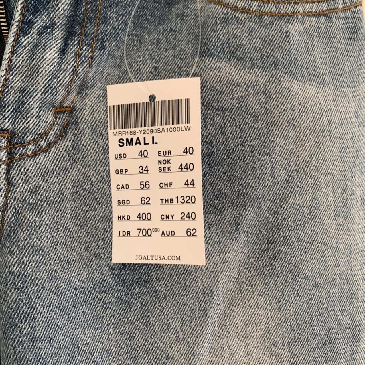 Light denim low rise flare jeans BRANDY MELVILLE...