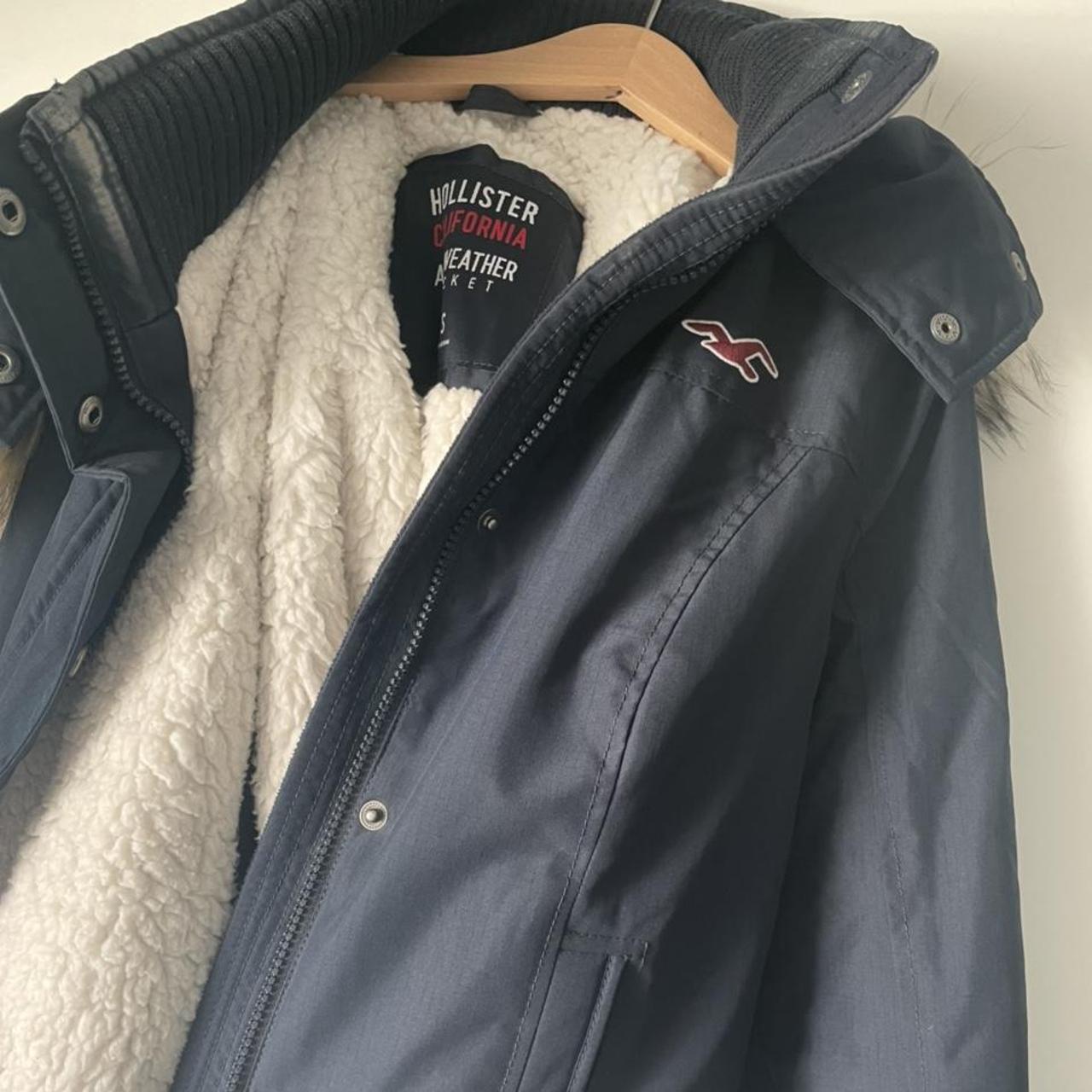 Hollister navy jacket with fluffy hood - size... - Depop