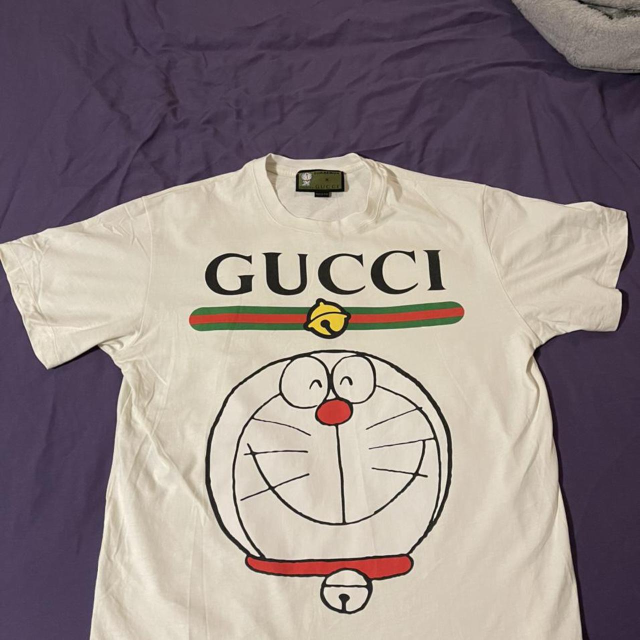 Doraemon x gucci tshirt size M bought from gucci for... - Depop