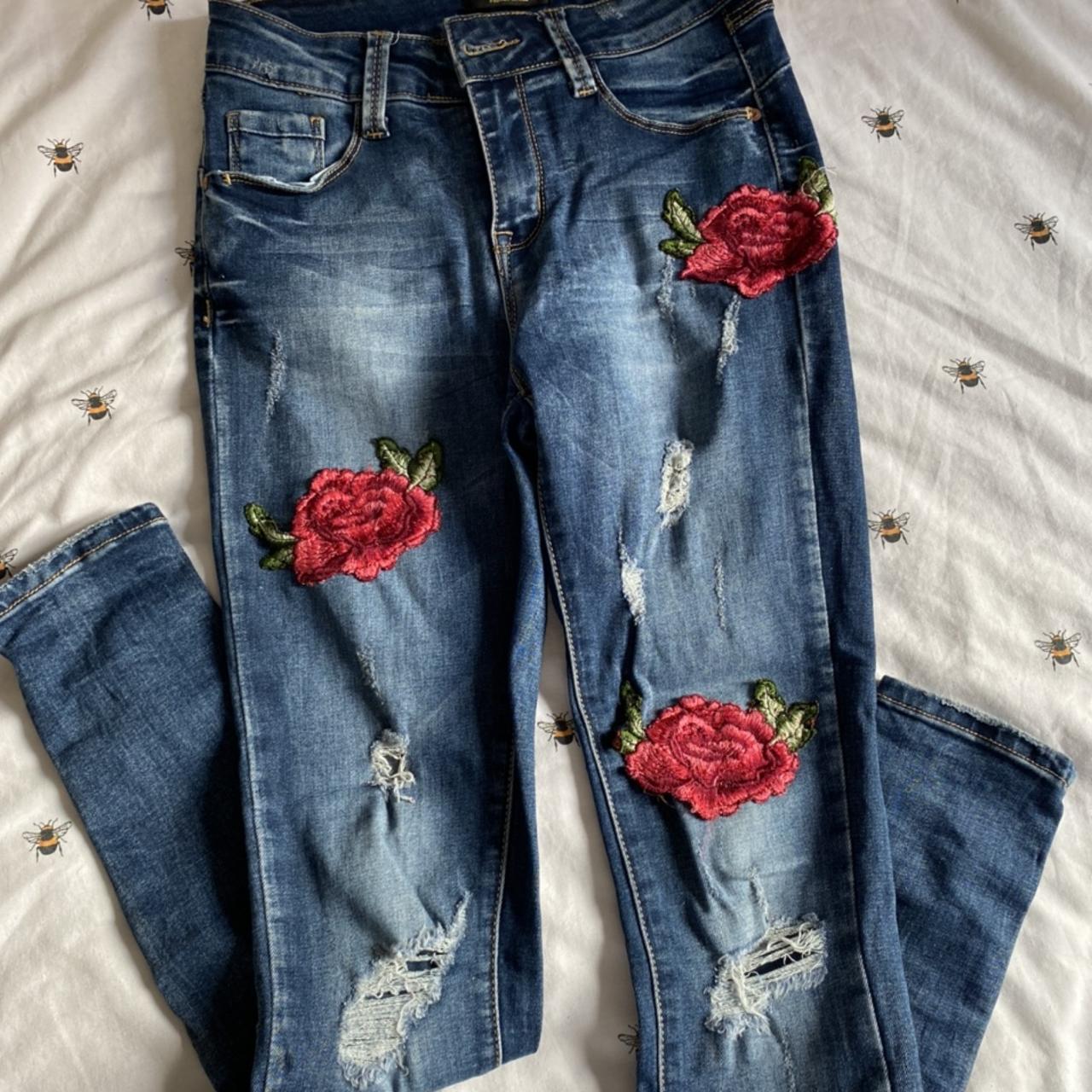 Rose ripped hot sale jeans