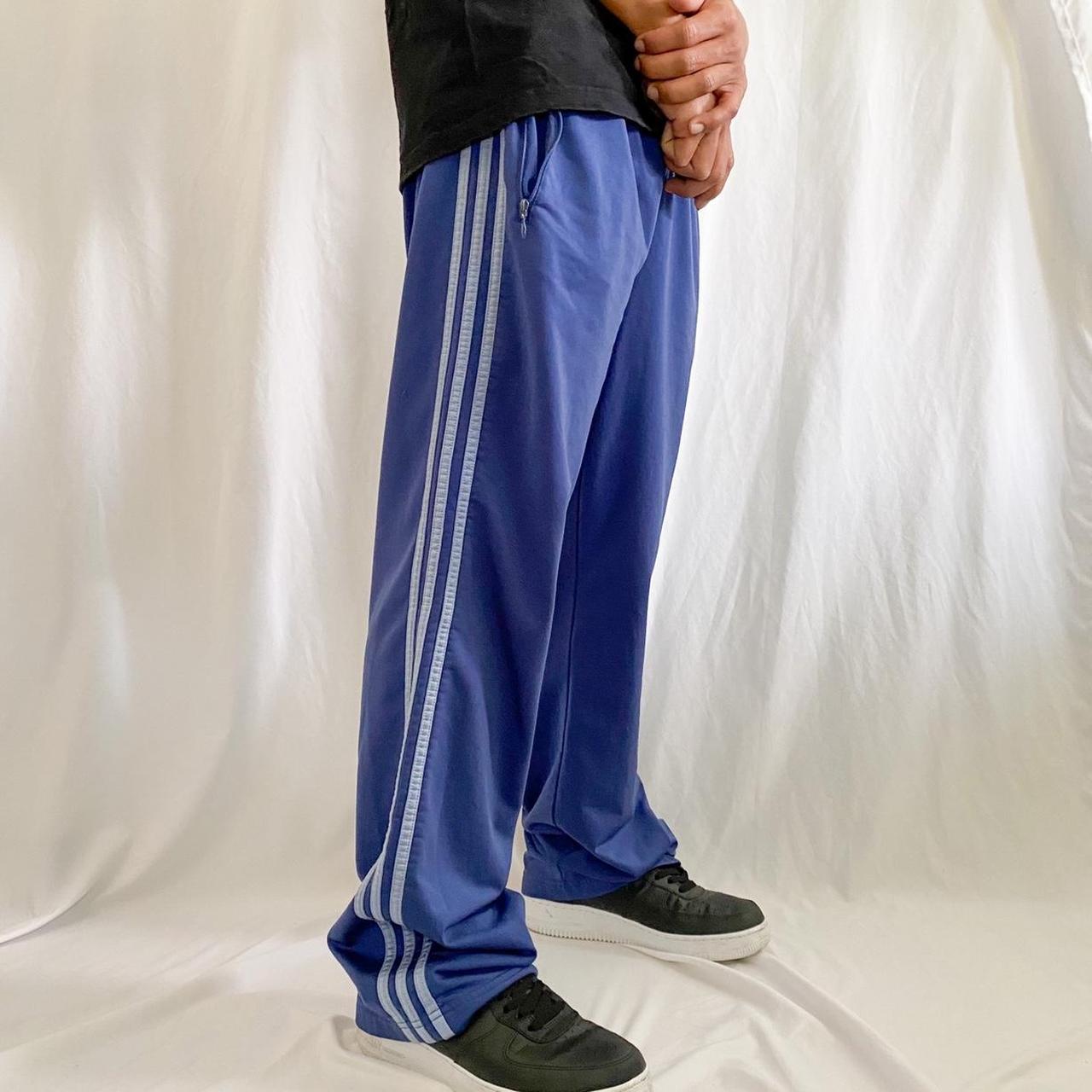 LIGHT BLUE ADIDAS TRACK PANTS WITH ZIPPERS ON THE... Depop