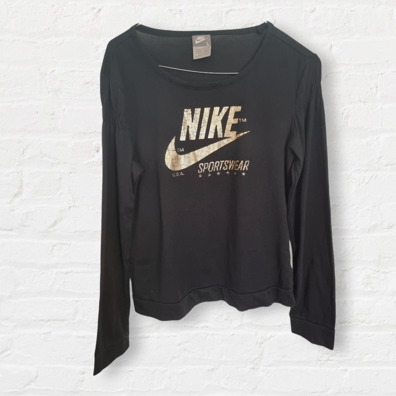 rose gold and black nike shirt