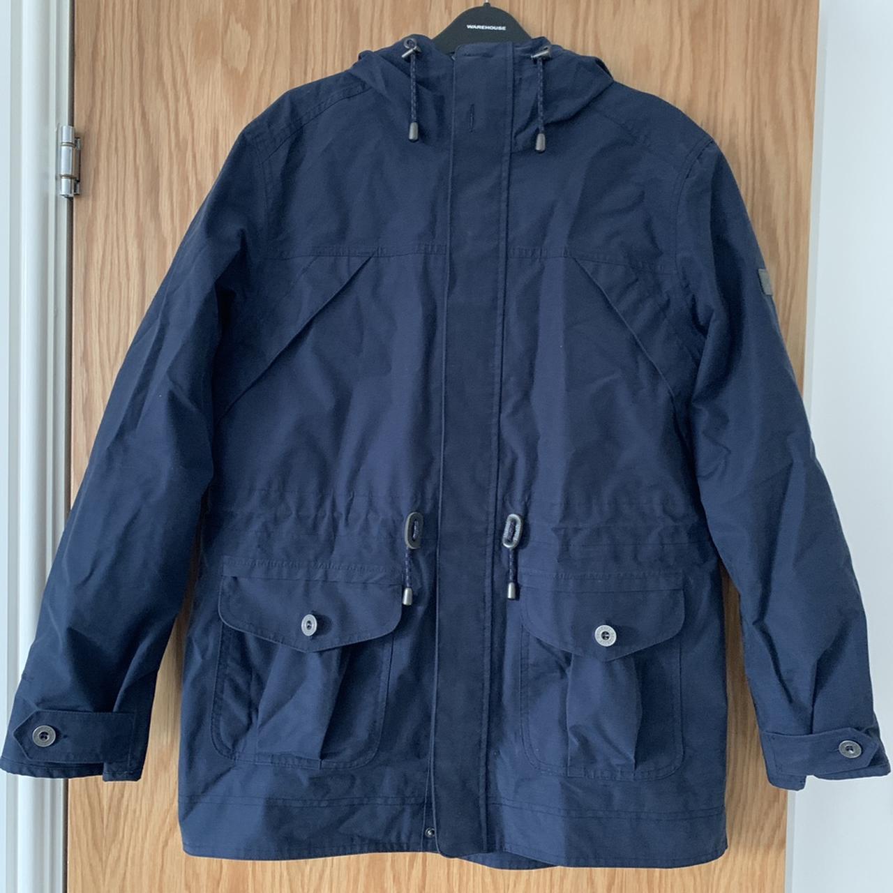 Berghaus navy jacket. Has multiple button and toggle... - Depop