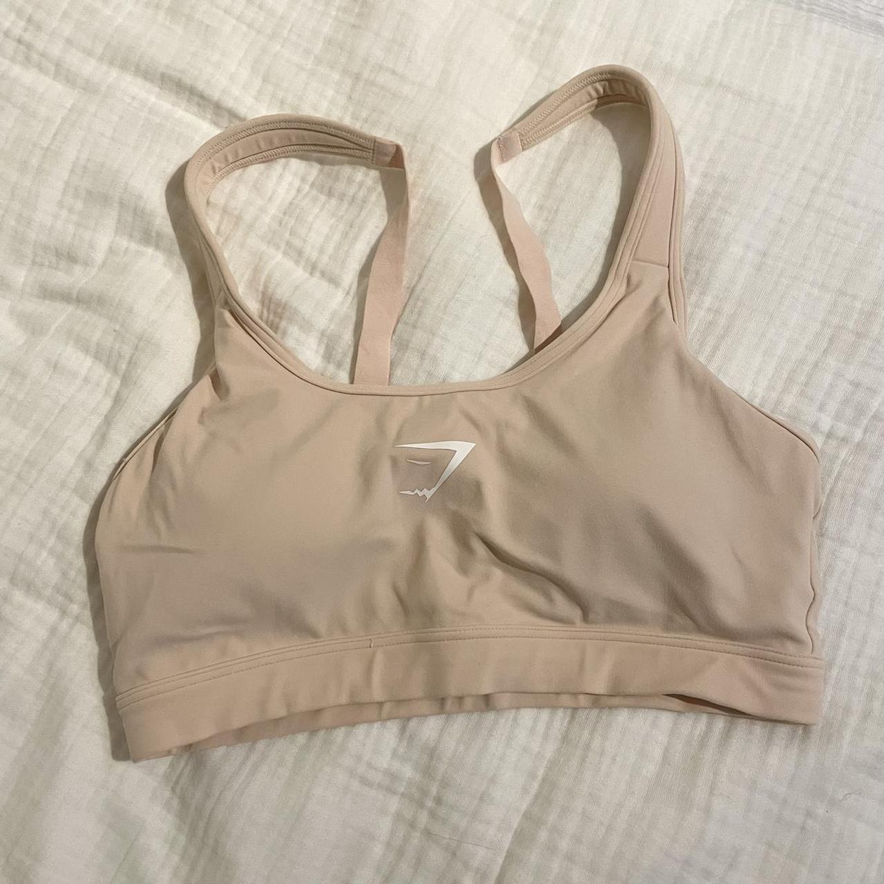 Gymshark medium support sports bra in clay pink.... Depop