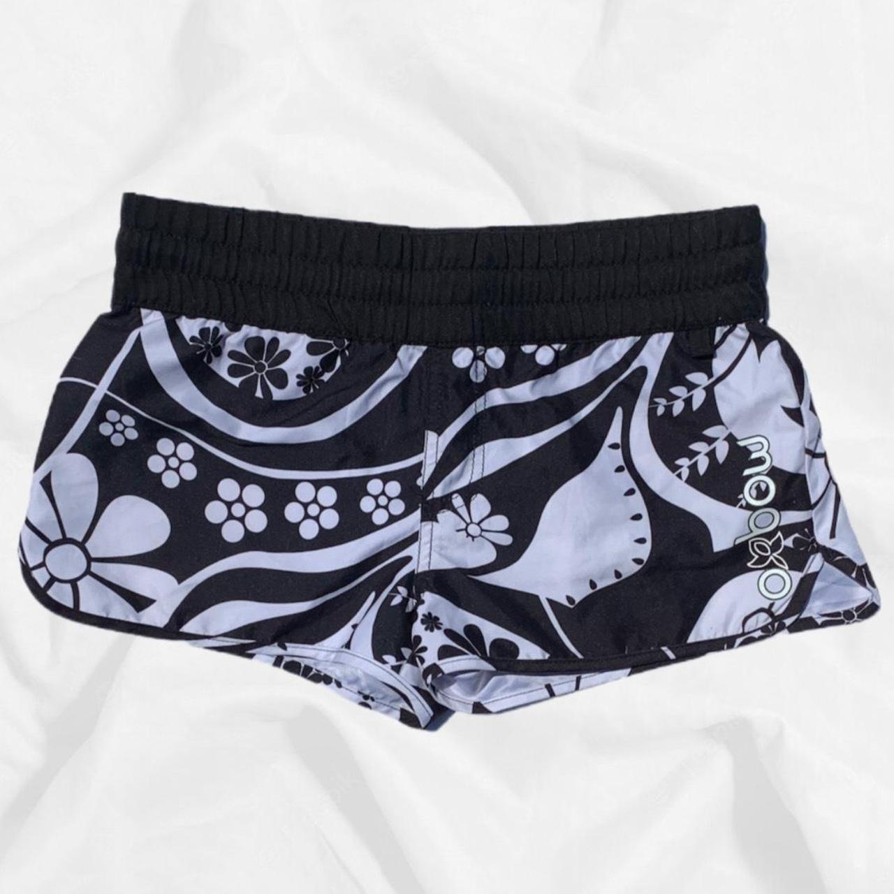Product Image 1 - Oxbow Hibiscus Beach Shorts

Labelled as