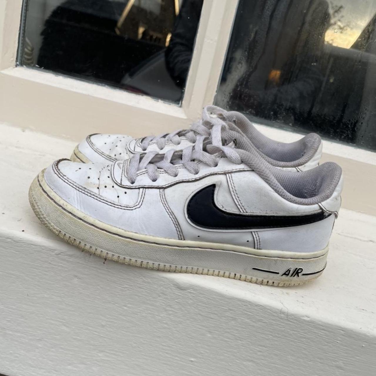 white air force 1s black tick