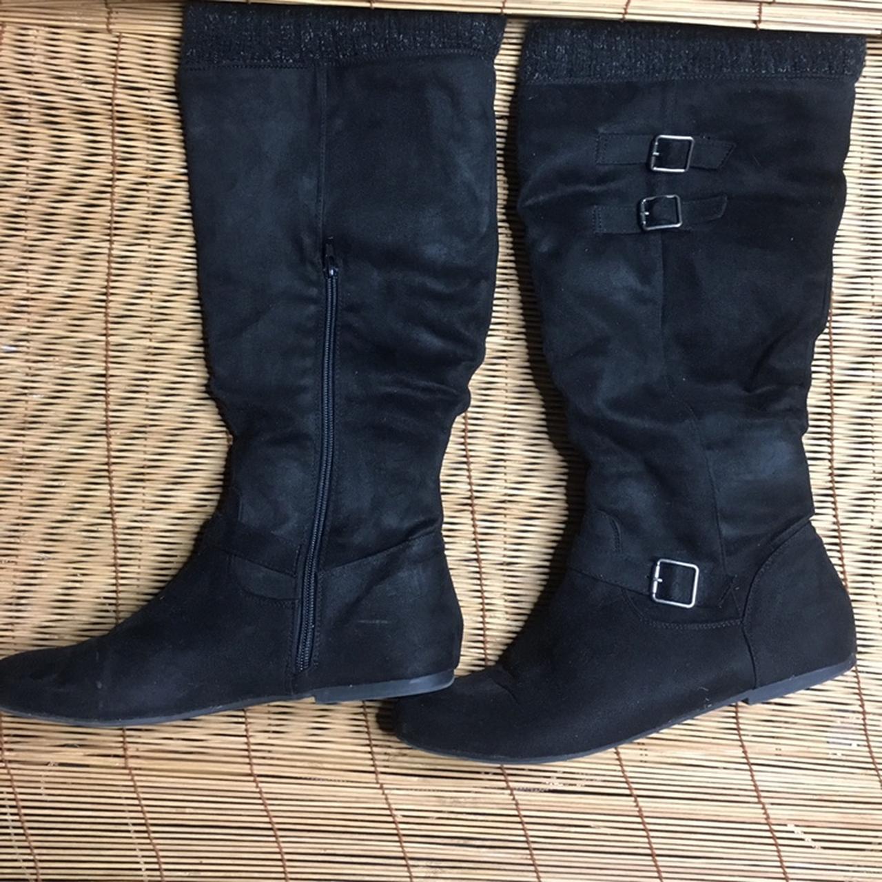 black boots with sweater cuff