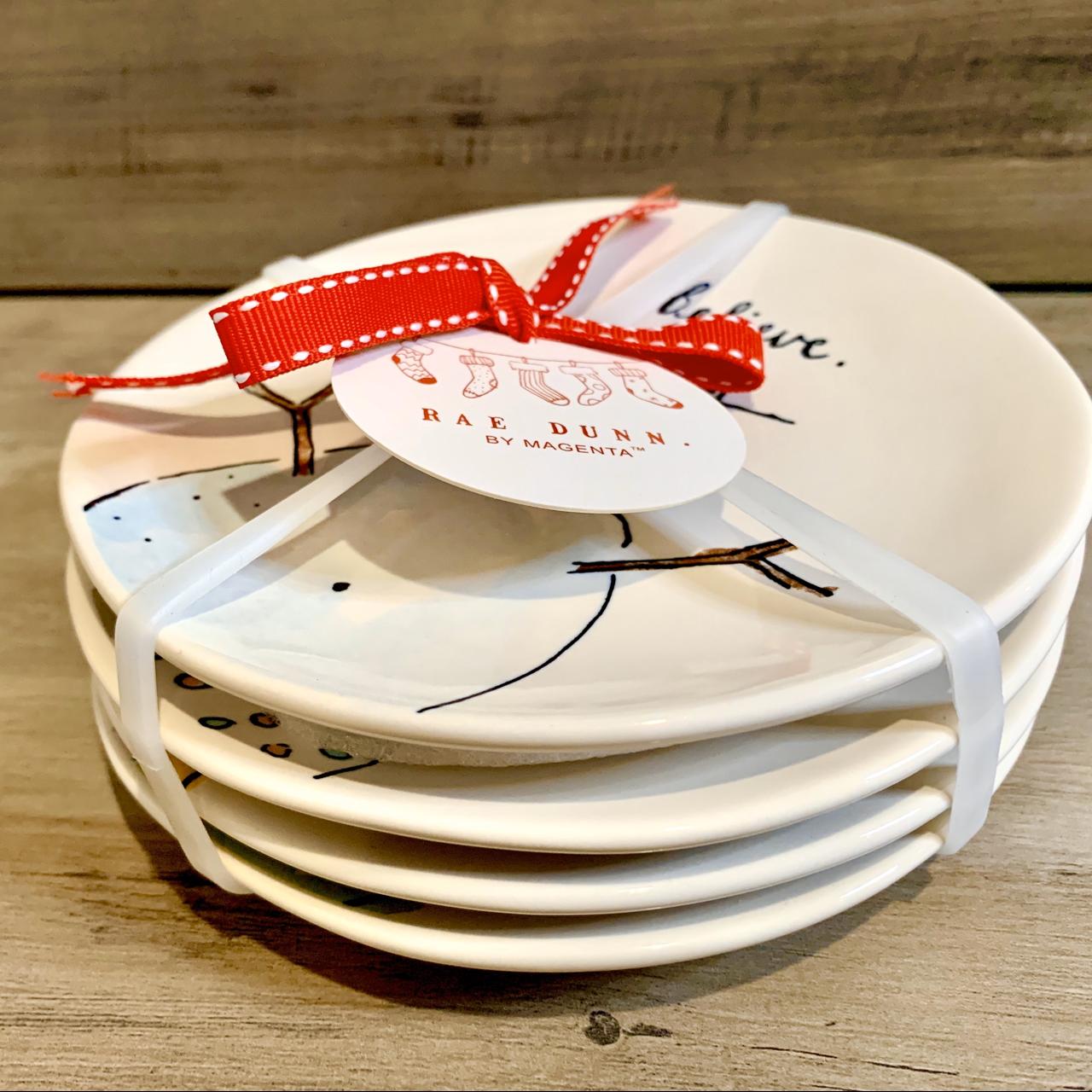 Rae Dunn offers large snowman believe plates