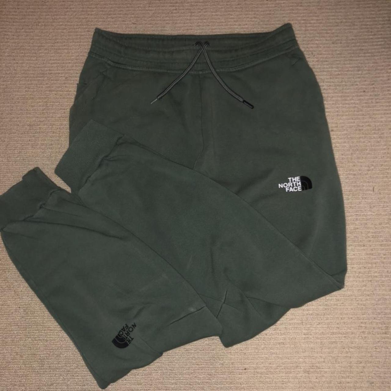 green north face tracksuit