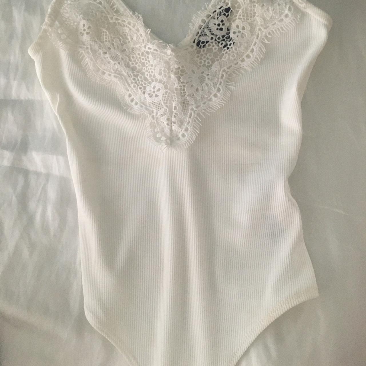 White lace cleavage body suit Stretchy material - Depop