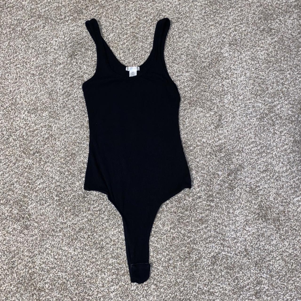 Bozzolo Black Ribbed Bodysuit with Small Slit on - Depop