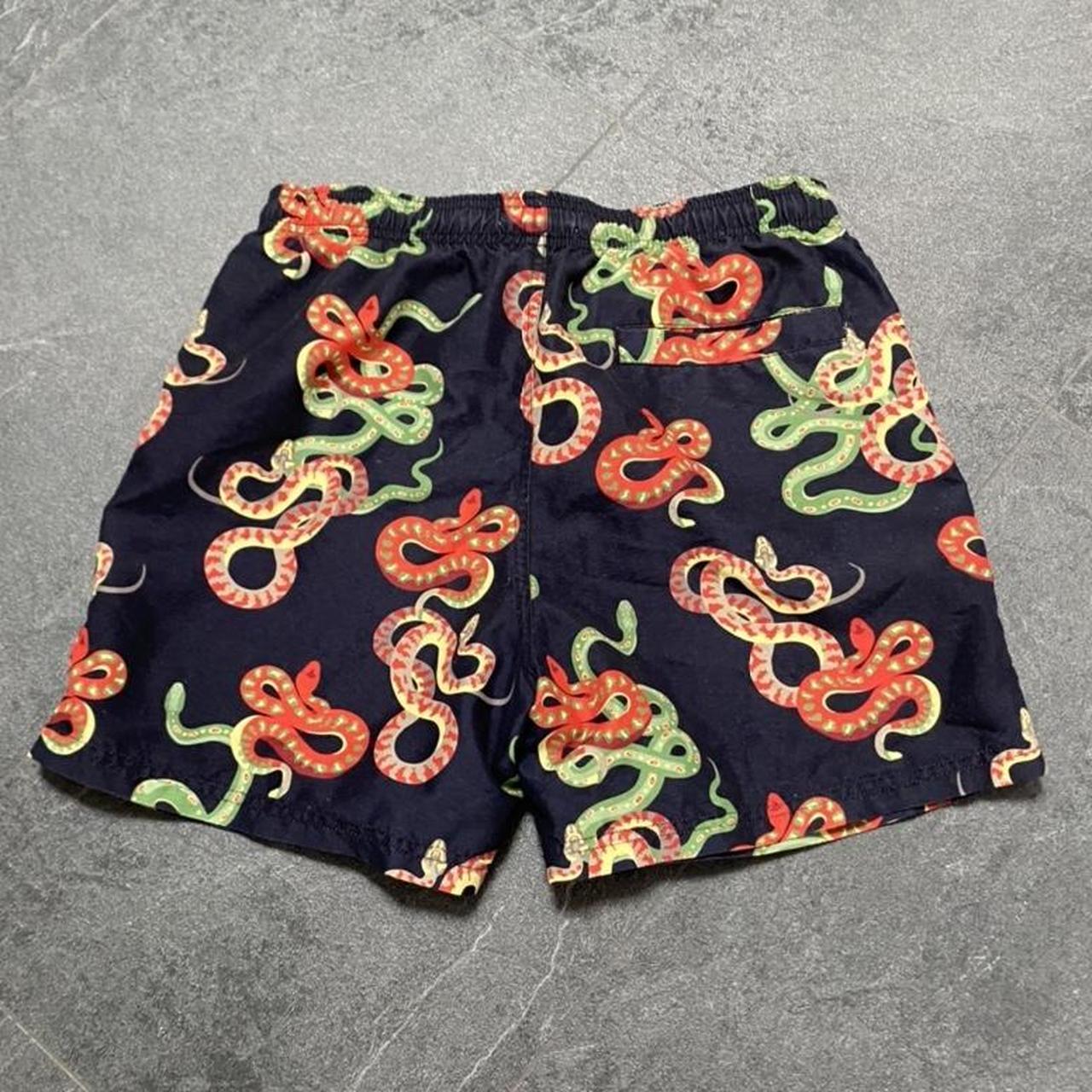 Gucci tiger hot sale swim shorts