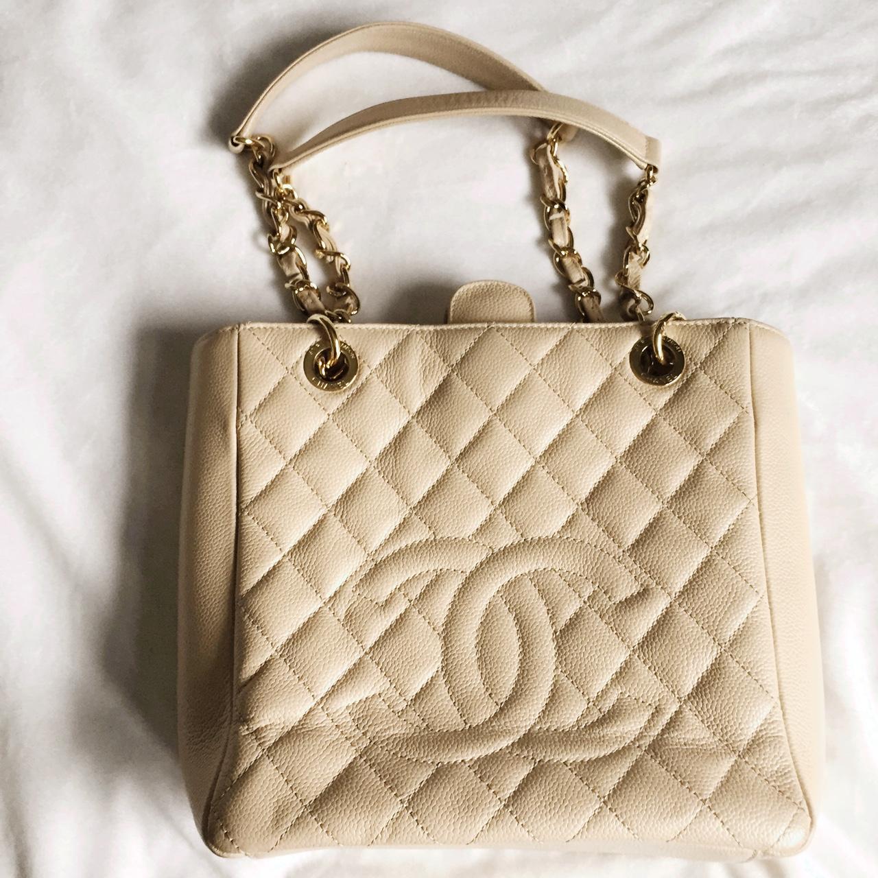 Authentic Chanel PST beige caviar. Signs of wear are
