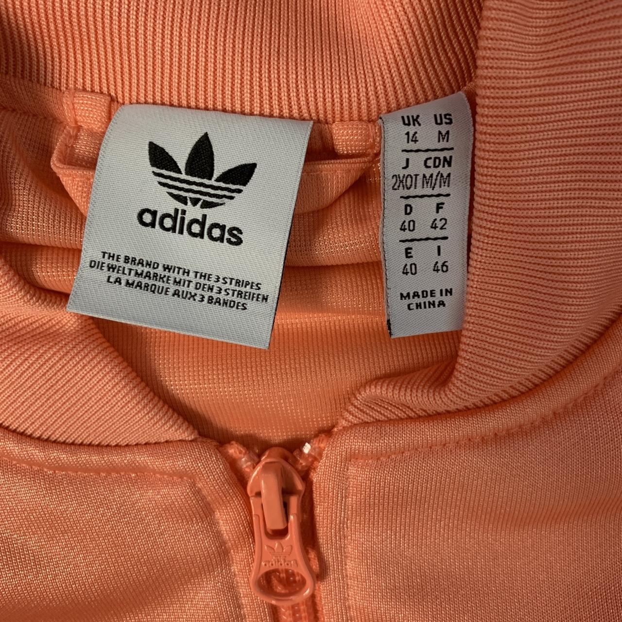peach color shoes adidas