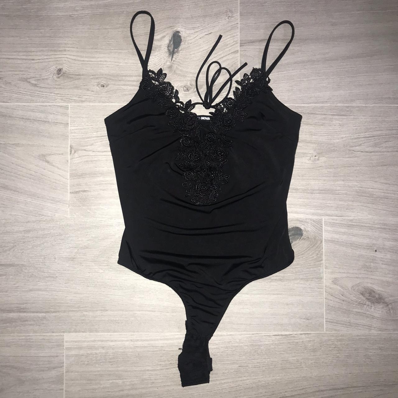 Fashion nova black lace up bodysuit 🦄 size small... Depop