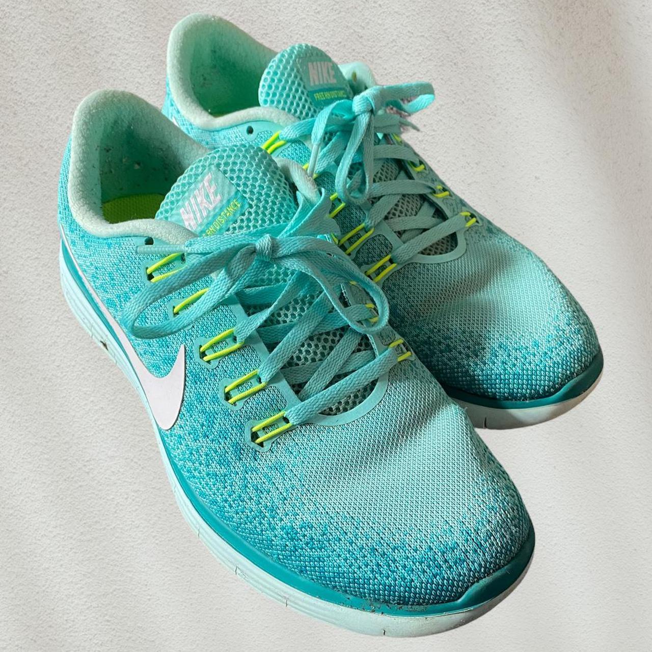 Nike blue turquoise running shoes white sole . Worn... Depop