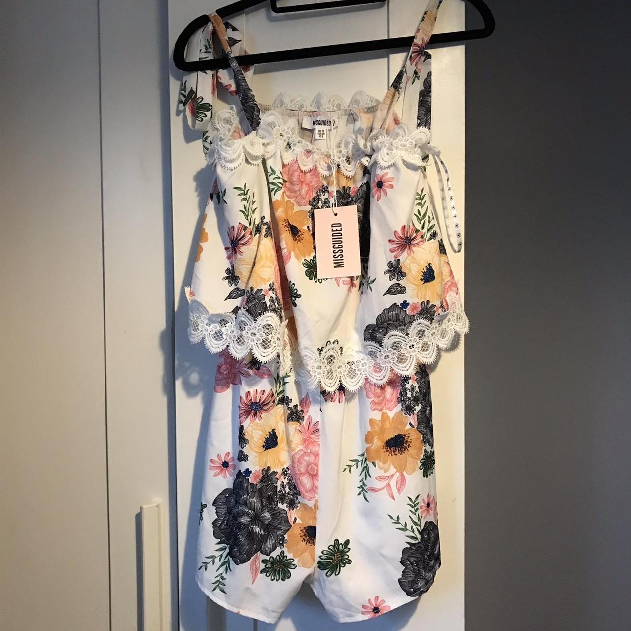 Missguided floral playsuit. Size 10. Would fit a