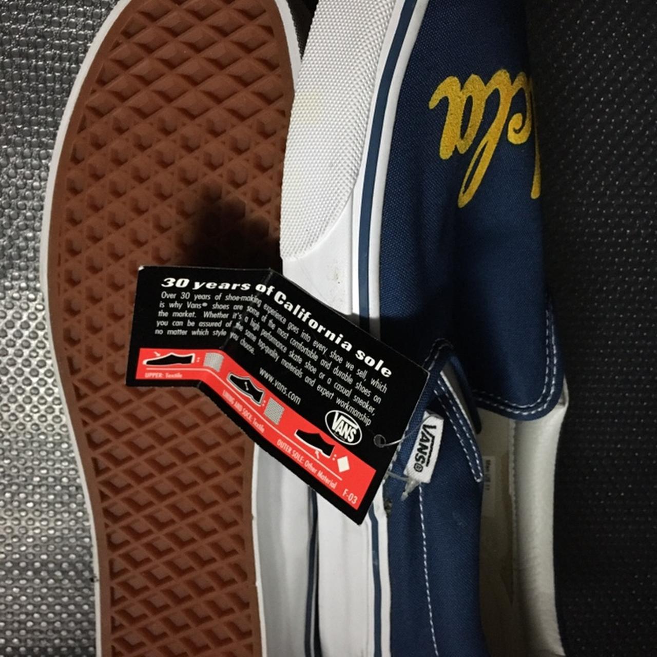 Custom UCLA slip on vans. Just cleaning up. Getting...