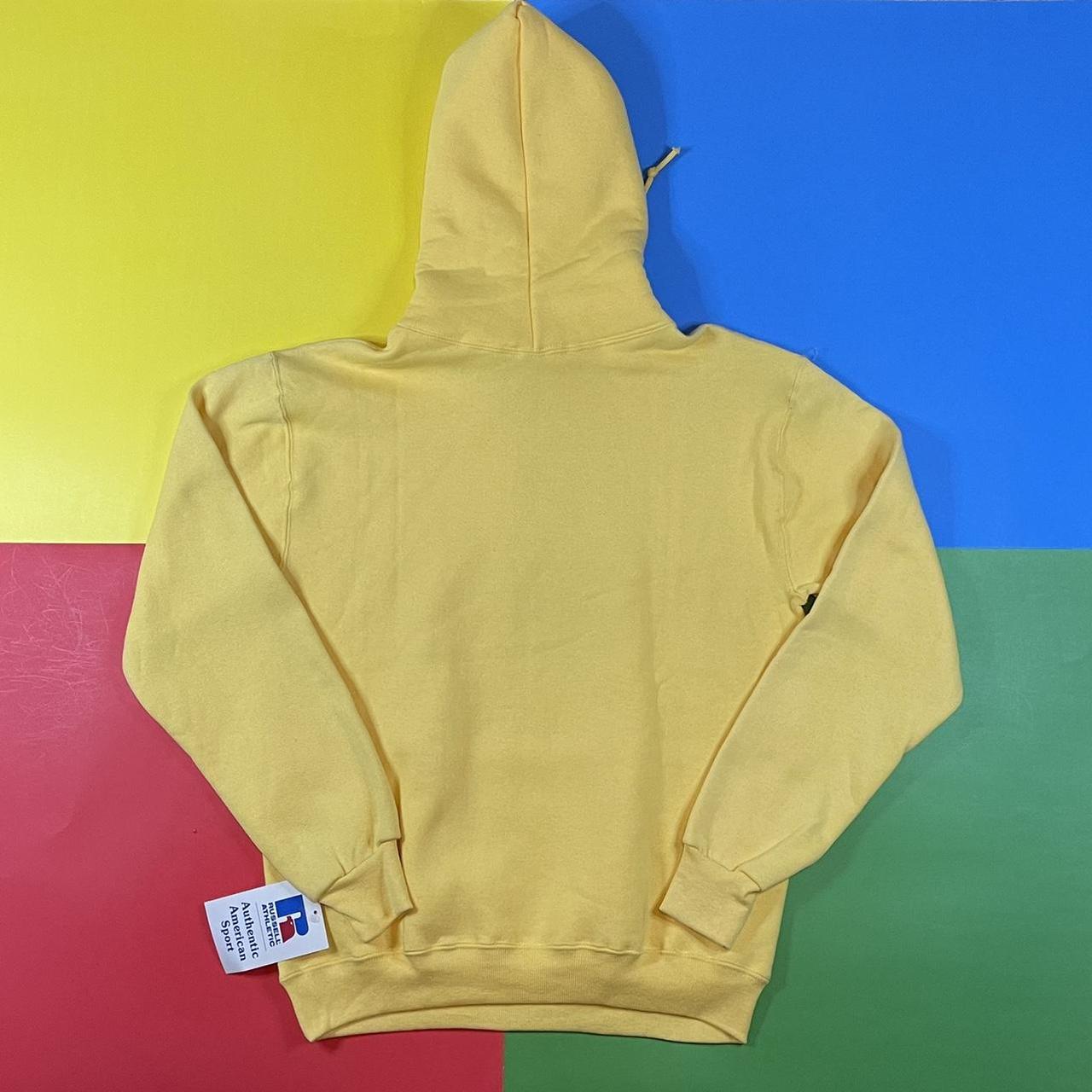 Vintage Russell Athletic hoodie. 90’s light yellow... - Depop