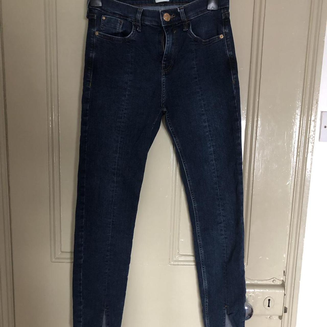 River Island navy jeans with split ends. Great... - Depop