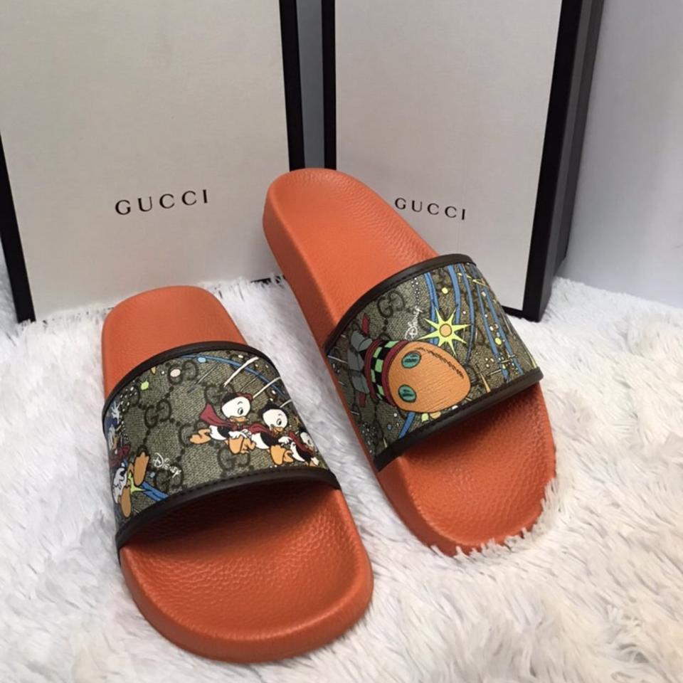 Gucci donald store duck slides