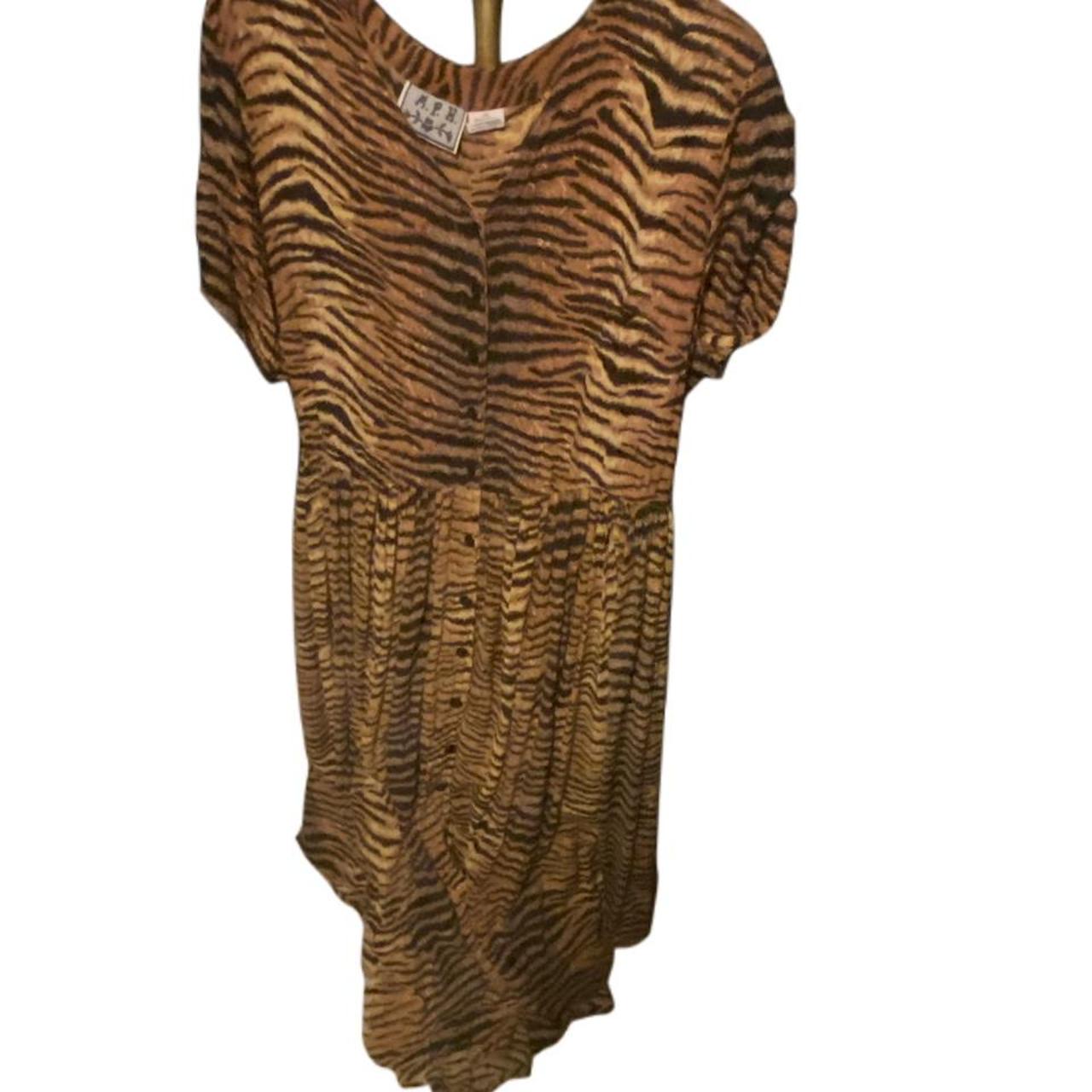 Tiger print maxi dress. Size 1X. Made of rayon. So... - Depop