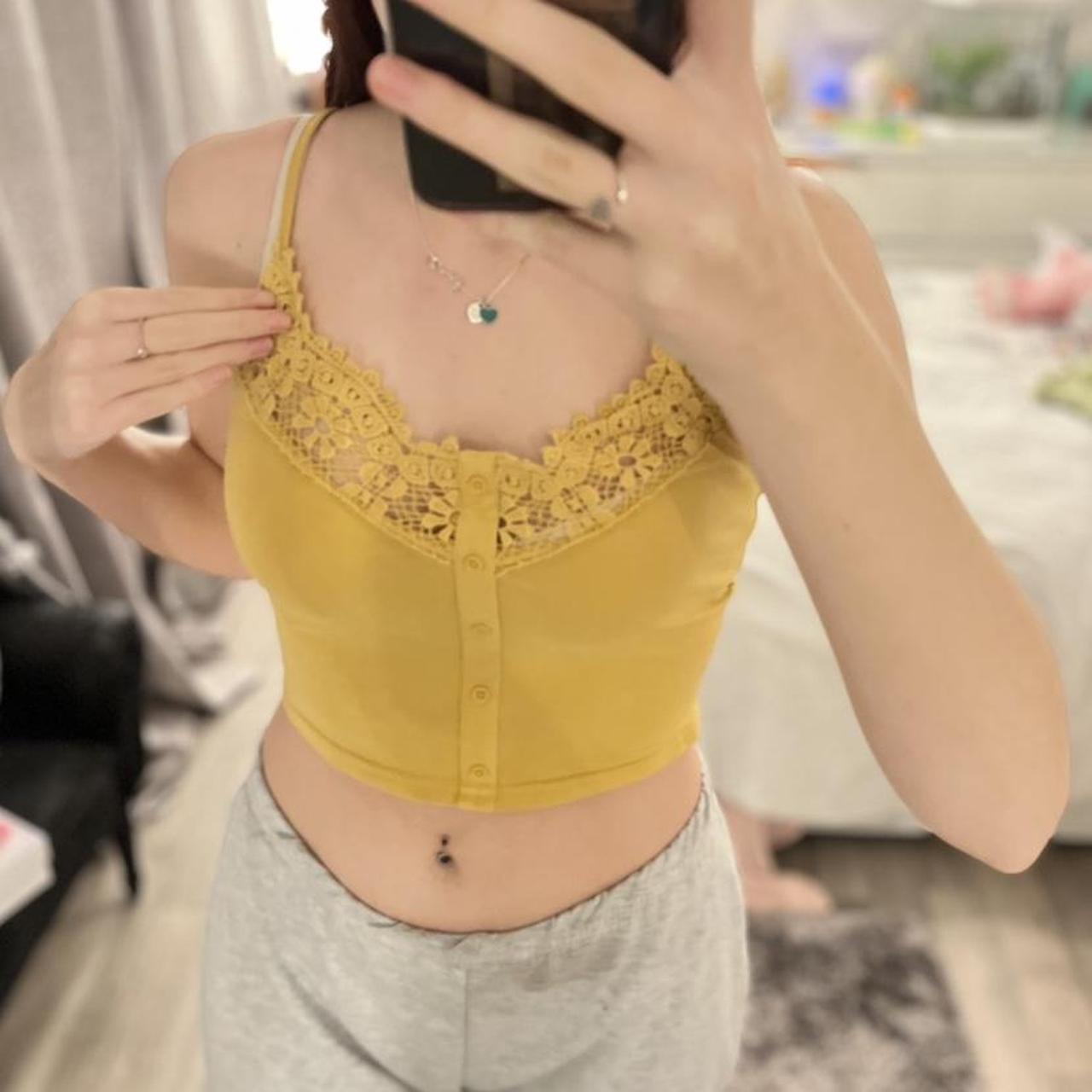 yellow crop top with fake buttons and mesh supper... Depop